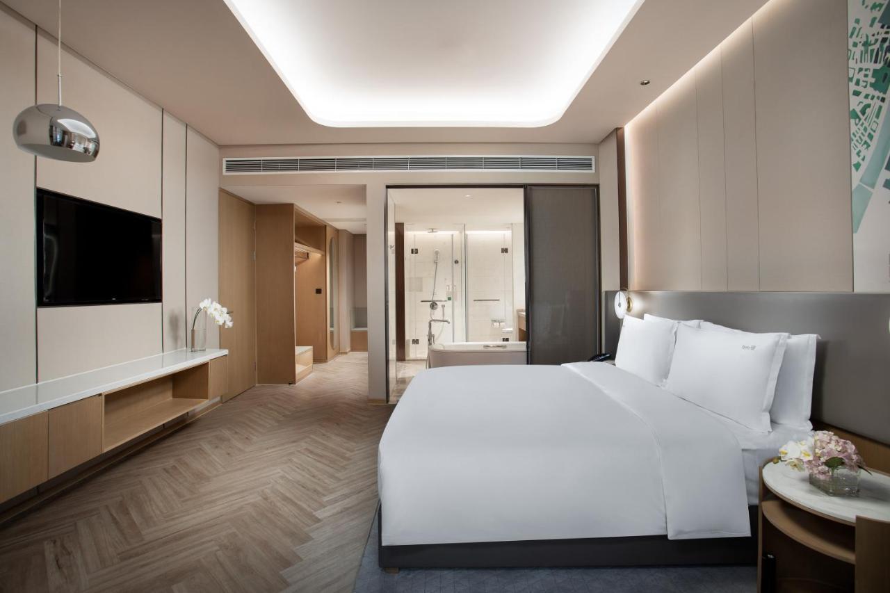 Holiday Inn Wuxi Central Station By Ihg Bagian luar foto